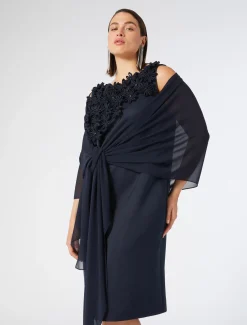 Abito in duchesse con ricami