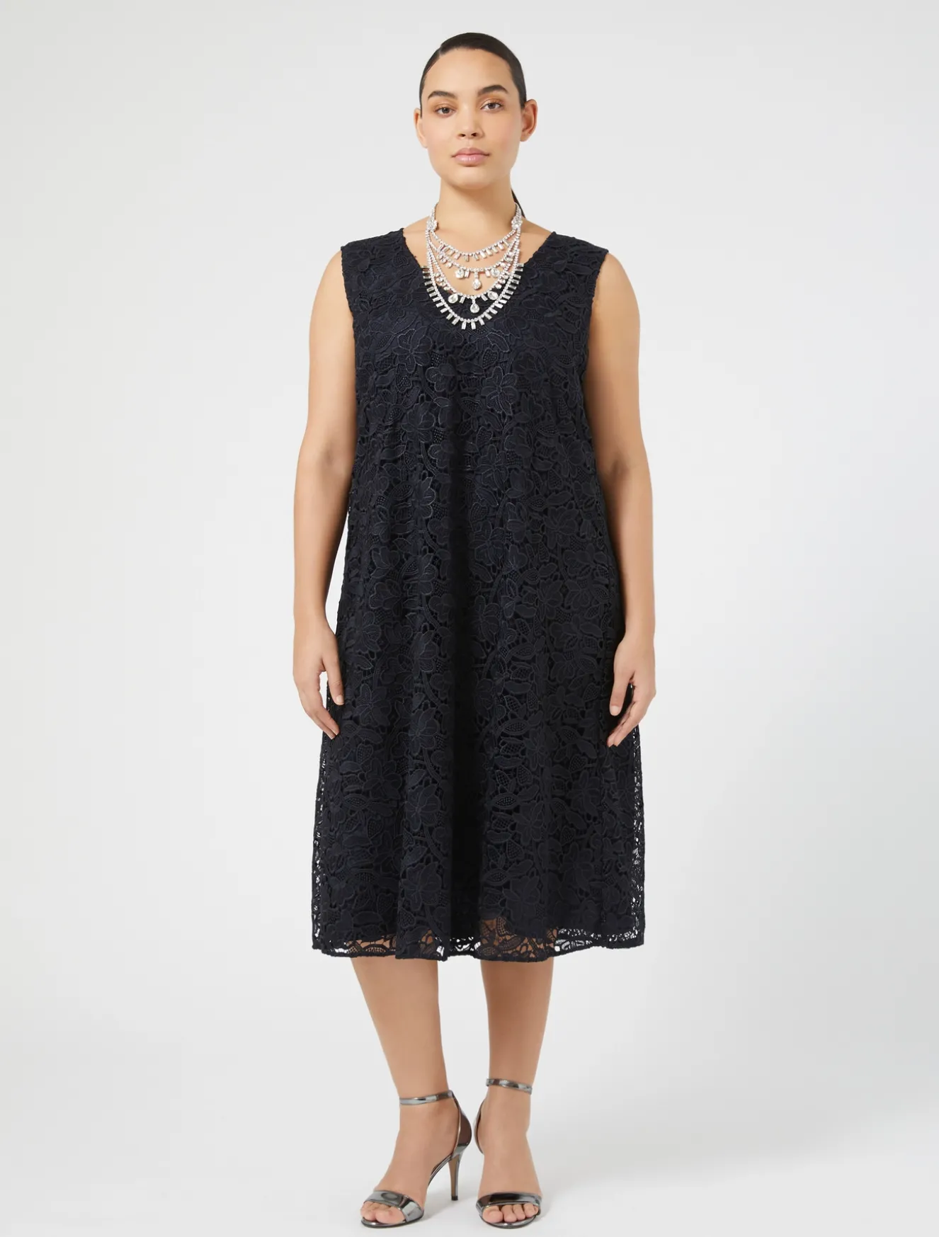 Abito in pizzo laminato