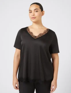 Blusa con dettagli in pizzo