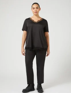 Blusa con dettagli in pizzo