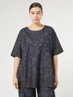 Blusa in denim laserato