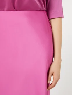 Gonna in raso fluido