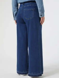 Jeans in denim con strass