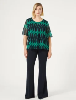 Pantaloni flare in cady