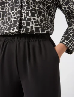 Pantaloni in crêpe envers satin