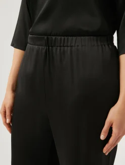 Pantaloni in frisottino lucido