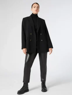 Pantaloni in tessuto spalmato