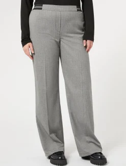 Pantaloni in tessuto tinto filo e lurex