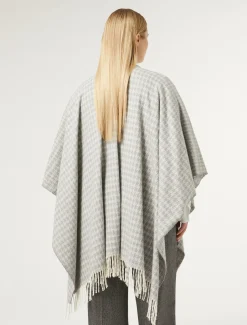 Poncho in tessuto tinto filo