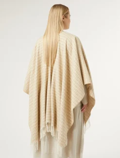 Poncho in tessuto tinto filo