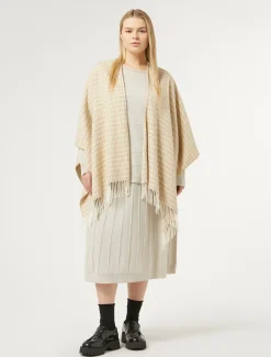 Poncho in tessuto tinto filo