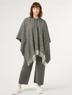 Poncho in tessuto tinto filo